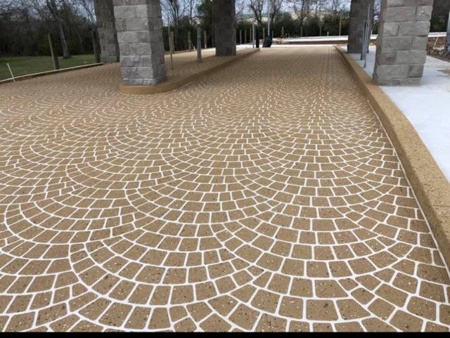 Fan-pattern stamped concrete driveway
